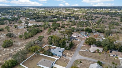 Build your dream home on this spacious 0.3444-acre homesite on Spring Hill Golf Course in Florida - for sale on GolfHomes.com, golf home, golf lot