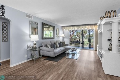 UPDATED & MOVE-IN READY! Turnkey in Portofino at Wynmoor with on Wynmoor Golf Course in Florida - for sale on GolfHomes.com, golf home, golf lot