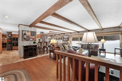 Positioned on corner parcel, this home blends comfort & casual on  in Michigan - for sale on GolfHomes.com, golf home, golf lot