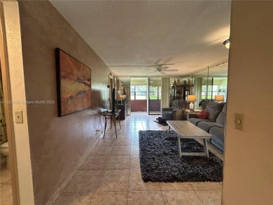 PRICED TO SELL IN SOUGHT AFTER 55+ SUNRISE LAKES PHASE IV. FIRST on Sunrise Lakes Phase IV Golf Course in Florida - for sale on GolfHomes.com, golf home, golf lot