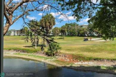 UPDATED & MOVE-IN READY! Turnkey in Portofino at Wynmoor with on Wynmoor Golf Course in Florida - for sale on GolfHomes.com, golf home, golf lot