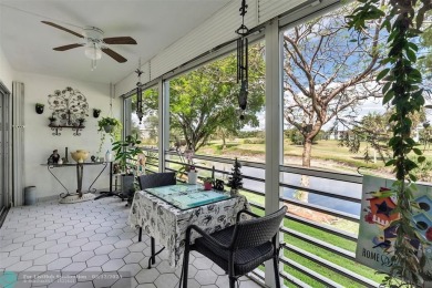 UPDATED & MOVE-IN READY! Turnkey in Portofino at Wynmoor with on Wynmoor Golf Course in Florida - for sale on GolfHomes.com, golf home, golf lot