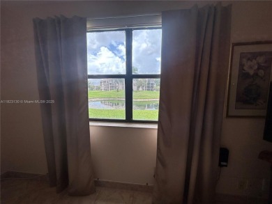 PRICED TO SELL IN SOUGHT AFTER 55+ SUNRISE LAKES PHASE IV. FIRST on Sunrise Lakes Phase IV Golf Course in Florida - for sale on GolfHomes.com, golf home, golf lot