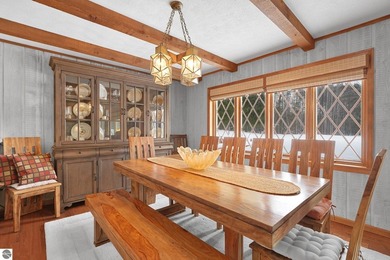 Positioned on corner parcel, this home blends comfort & casual on  in Michigan - for sale on GolfHomes.com, golf home, golf lot