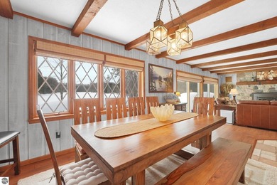 Positioned on corner parcel, this home blends comfort & casual on  in Michigan - for sale on GolfHomes.com, golf home, golf lot