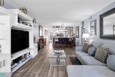 UPDATED & MOVE-IN READY! Turnkey in Portofino at Wynmoor with on Wynmoor Golf Course in Florida - for sale on GolfHomes.com, golf home, golf lot