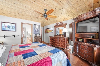 Positioned on corner parcel, this home blends comfort & casual on  in Michigan - for sale on GolfHomes.com, golf home, golf lot