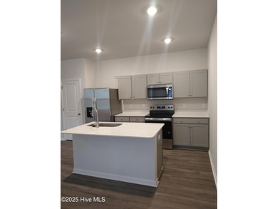 This inviting floor plan is designed for both comfort and on Harbour Point Golf Club in North Carolina - for sale on GolfHomes.com, golf home, golf lot