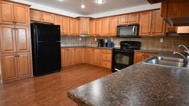 This beautifully maintained 3-bedroom, 2-bath home offers 1,650 on Cottonwood Country Club in Montana - for sale on GolfHomes.com, golf home, golf lot