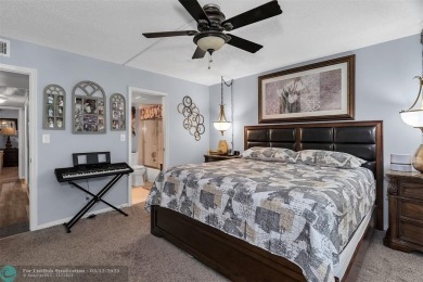 UPDATED & MOVE-IN READY! Turnkey in Portofino at Wynmoor with on Wynmoor Golf Course in Florida - for sale on GolfHomes.com, golf home, golf lot