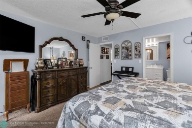 UPDATED & MOVE-IN READY! Turnkey in Portofino at Wynmoor with on Wynmoor Golf Course in Florida - for sale on GolfHomes.com, golf home, golf lot