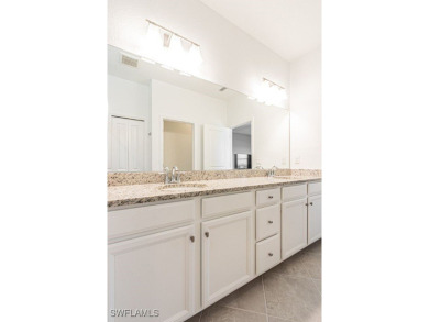 Why buy new, this 2 year new home is ready for you to move in on River Hall Country Club in Florida - for sale on GolfHomes.com, golf home, golf lot