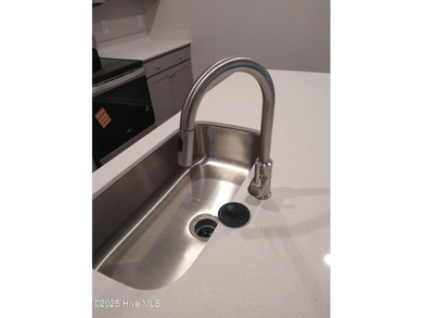 This inviting floor plan is designed for both comfort and on Harbour Point Golf Club in North Carolina - for sale on GolfHomes.com, golf home, golf lot