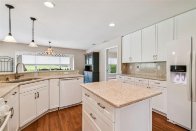 A rare Sun City Center find! This stunning balcony home has on Caloosa Greens Executive Golf Course in Florida - for sale on GolfHomes.com, golf home, golf lot