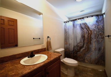 This beautifully maintained 3-bedroom, 2-bath home offers 1,650 on Cottonwood Country Club in Montana - for sale on GolfHomes.com, golf home, golf lot