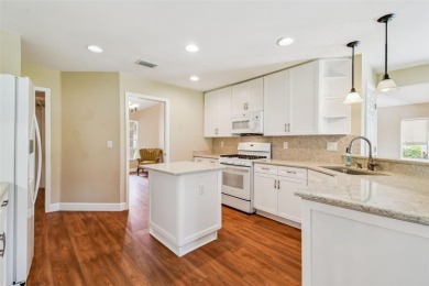 A rare Sun City Center find! This stunning balcony home has on Caloosa Greens Executive Golf Course in Florida - for sale on GolfHomes.com, golf home, golf lot