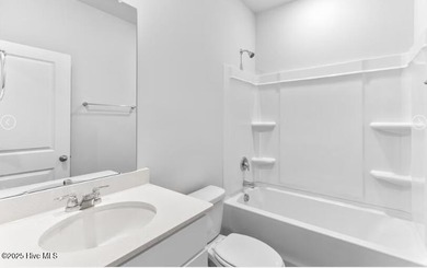 This inviting floor plan is designed for both comfort and on Harbour Point Golf Club in North Carolina - for sale on GolfHomes.com, golf home, golf lot