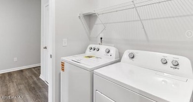 This inviting floor plan is designed for both comfort and on Harbour Point Golf Club in North Carolina - for sale on GolfHomes.com, golf home, golf lot