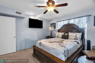 UPDATED & MOVE-IN READY! Turnkey in Portofino at Wynmoor with on Wynmoor Golf Course in Florida - for sale on GolfHomes.com, golf home, golf lot
