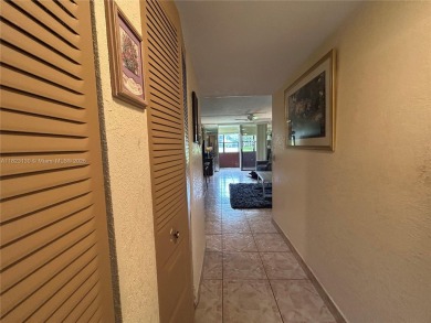 PRICED TO SELL IN SOUGHT AFTER 55+ SUNRISE LAKES PHASE IV. FIRST on Sunrise Lakes Phase IV Golf Course in Florida - for sale on GolfHomes.com, golf home, golf lot