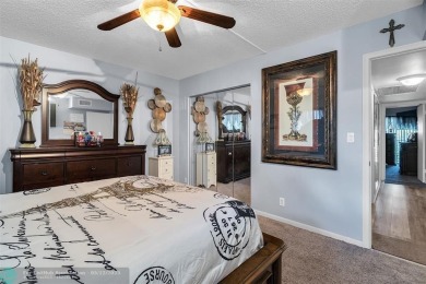 UPDATED & MOVE-IN READY! Turnkey in Portofino at Wynmoor with on Wynmoor Golf Course in Florida - for sale on GolfHomes.com, golf home, golf lot