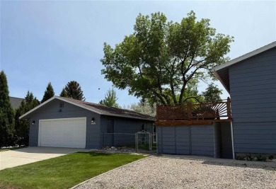 Welcome to this well-maintained 4-bedroom, 2-bath home ideally on Olive Glenn Golf and Country Club in Wyoming - for sale on GolfHomes.com, golf home, golf lot