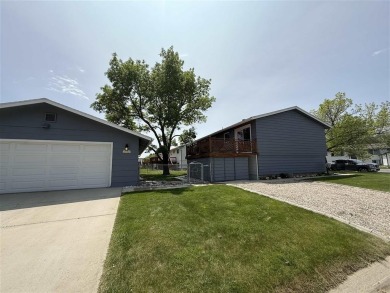 Welcome to this well-maintained 4-bedroom, 2-bath home ideally on Olive Glenn Golf and Country Club in Wyoming - for sale on GolfHomes.com, golf home, golf lot