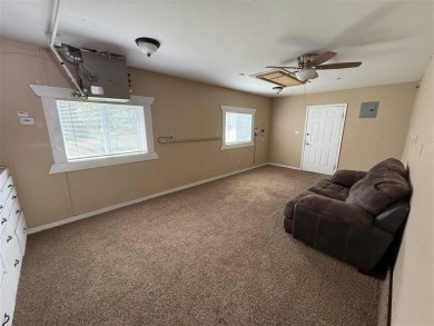 Welcome to this well-maintained 4-bedroom, 2-bath home ideally on Olive Glenn Golf and Country Club in Wyoming - for sale on GolfHomes.com, golf home, golf lot