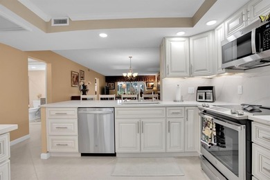Discover unparalleled elegance and functionality in this on Wynmoor Golf Course in Florida - for sale on GolfHomes.com, golf home, golf lot