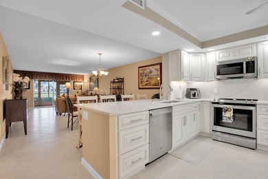 Discover unparalleled elegance and functionality in this on Wynmoor Golf Course in Florida - for sale on GolfHomes.com, golf home, golf lot