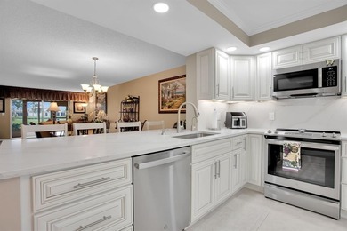 Discover unparalleled elegance and functionality in this on Wynmoor Golf Course in Florida - for sale on GolfHomes.com, golf home, golf lot