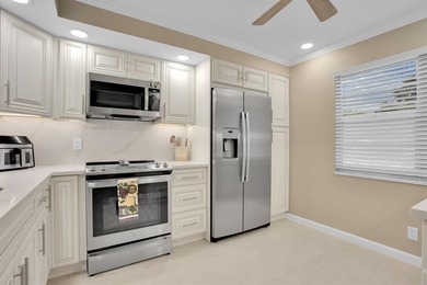 Discover unparalleled elegance and functionality in this on Wynmoor Golf Course in Florida - for sale on GolfHomes.com, golf home, golf lot