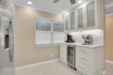Discover unparalleled elegance and functionality in this on Wynmoor Golf Course in Florida - for sale on GolfHomes.com, golf home, golf lot