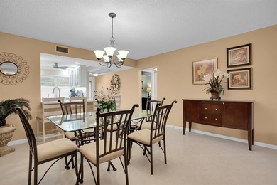 Discover unparalleled elegance and functionality in this on Wynmoor Golf Course in Florida - for sale on GolfHomes.com, golf home, golf lot