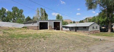 Located just two blocks from Hot Springs State Park and the on Legion Town And Country Club in Wyoming - for sale on GolfHomes.com, golf home, golf lot