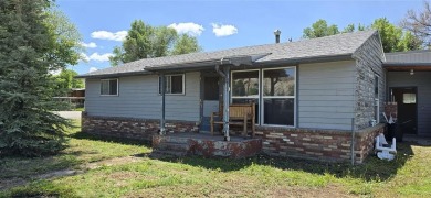 Located just two blocks from Hot Springs State Park and the on Legion Town And Country Club in Wyoming - for sale on GolfHomes.com, golf home, golf lot