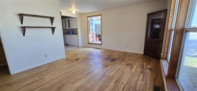 Located just two blocks from Hot Springs State Park and the on Legion Town And Country Club in Wyoming - for sale on GolfHomes.com, golf home, golf lot