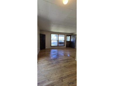 Located just two blocks from Hot Springs State Park and the on Legion Town And Country Club in Wyoming - for sale on GolfHomes.com, golf home, golf lot