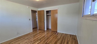 Located just two blocks from Hot Springs State Park and the on Legion Town And Country Club in Wyoming - for sale on GolfHomes.com, golf home, golf lot