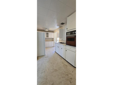 Located just two blocks from Hot Springs State Park and the on Legion Town And Country Club in Wyoming - for sale on GolfHomes.com, golf home, golf lot