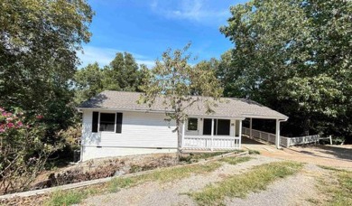 This well maintained home on 2 lots, has just been remodeled on Cherokee Village North Course in Arkansas - for sale on GolfHomes.com, golf home, golf lot