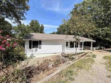 This well maintained home on 2 lots, has just been remodeled on Cherokee Village North Course in Arkansas - for sale on GolfHomes.com, golf home, golf lot