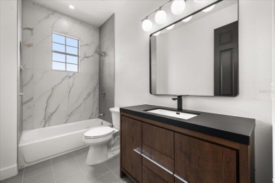 Meticulously upgraded and thoughtfully designed, this expansive on The Golden Bear Club At Keenes Pointe in Florida - for sale on GolfHomes.com, golf home, golf lot