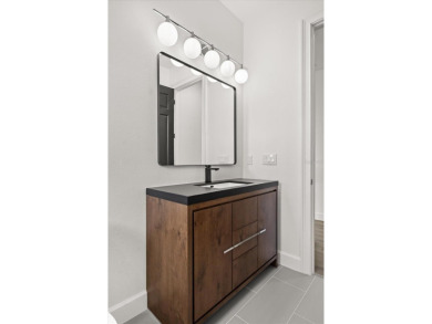 Meticulously upgraded and thoughtfully designed, this expansive on The Golden Bear Club At Keenes Pointe in Florida - for sale on GolfHomes.com, golf home, golf lot