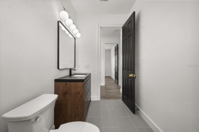 Meticulously upgraded and thoughtfully designed, this expansive on The Golden Bear Club At Keenes Pointe in Florida - for sale on GolfHomes.com, golf home, golf lot