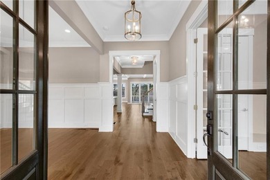 This executive estate redefines luxury living, boasting an on Cherokee Town and Country Club in Georgia - for sale on GolfHomes.com, golf home, golf lot