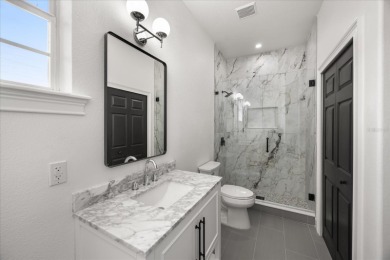 Meticulously upgraded and thoughtfully designed, this expansive on The Golden Bear Club At Keenes Pointe in Florida - for sale on GolfHomes.com, golf home, golf lot