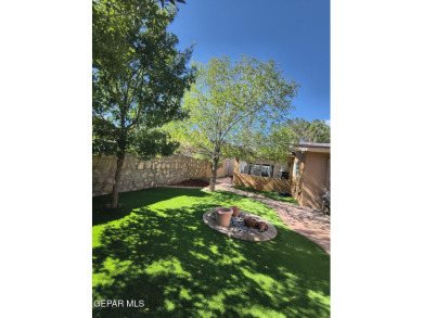 Situated in a serene cul-de-sac with a welcoming courtyard, this on Emerald Springs Golf Course in Texas - for sale on GolfHomes.com, golf home, golf lot