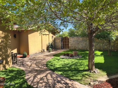 Situated in a serene cul-de-sac with a welcoming courtyard, this on Emerald Springs Golf Course in Texas - for sale on GolfHomes.com, golf home, golf lot