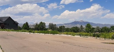 Stunning lot with mountain views in the city of Cody!  If you've on Olive Glenn Golf and Country Club in Wyoming - for sale on GolfHomes.com, golf home, golf lot